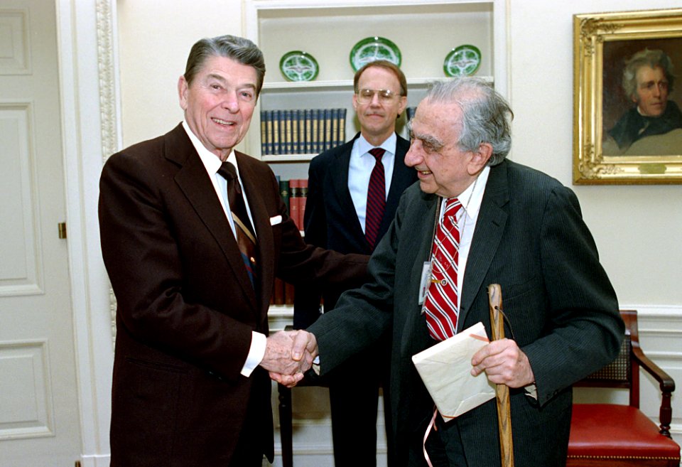 President Ronald Reagan shaking hands with Edward Teller