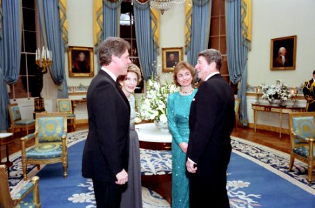 President Ronald Reagan and Nancy Reagan with Bill Clinton and Hillary Clinton in the Blue Room