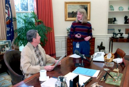 President Ronald Reagan talking with Florence Flo Taussig