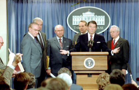 President Ronald Reagan Speaking at The Podium Making An Announcement to The Press on The Federal Deficit Reduction Budget Plan for Fiscal Years 1988 and 1989