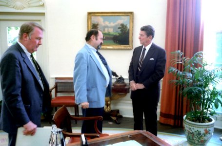 President Ronald Reagan talking with Lyn Nofziger with Ed Meese at left in the Oval Office