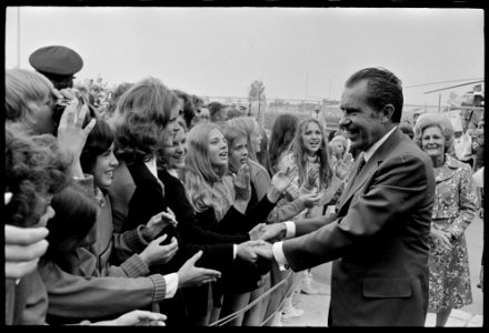 President Richard Nixon greets a Crowd of Students outside a Building at Dwight D. Eisenhower High School in Utica, Michigan after Attending a School Dedication Ceremony
