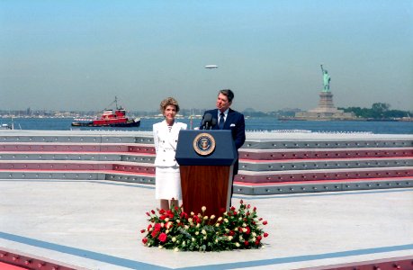 President Ronald Reagan with Nancy Reagan giving a speech during Operation Sail on Governors Island New York photo