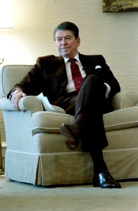 President Ronald Reagan watching the H.R. 540 Contra Aid Bill on television in the Oval Office Study
