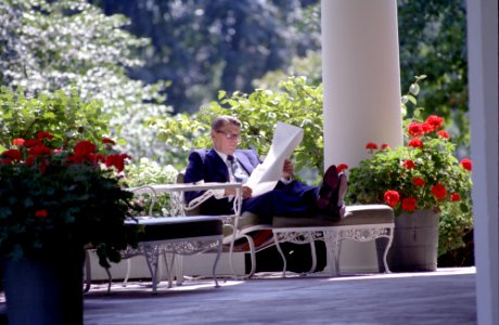 President Ronald Reagan working alone on colonnade outside the Oval Office