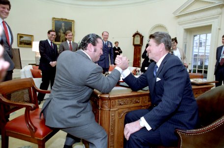 President Ronald Reagan Arm Wrestling Dan Lurie of Muscle Training Magazine in Oval Office photo