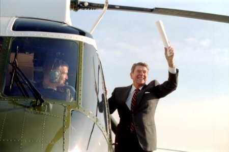 President Ronald Reagan waving on departure on helicopter Marine One from Dobbins Air Force Base