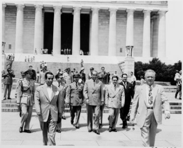 President Romulo Gallegos of Venezuela visits the Lincoln Memorial. He is leaving the wreath laying ceremony with... - NARA - 199835