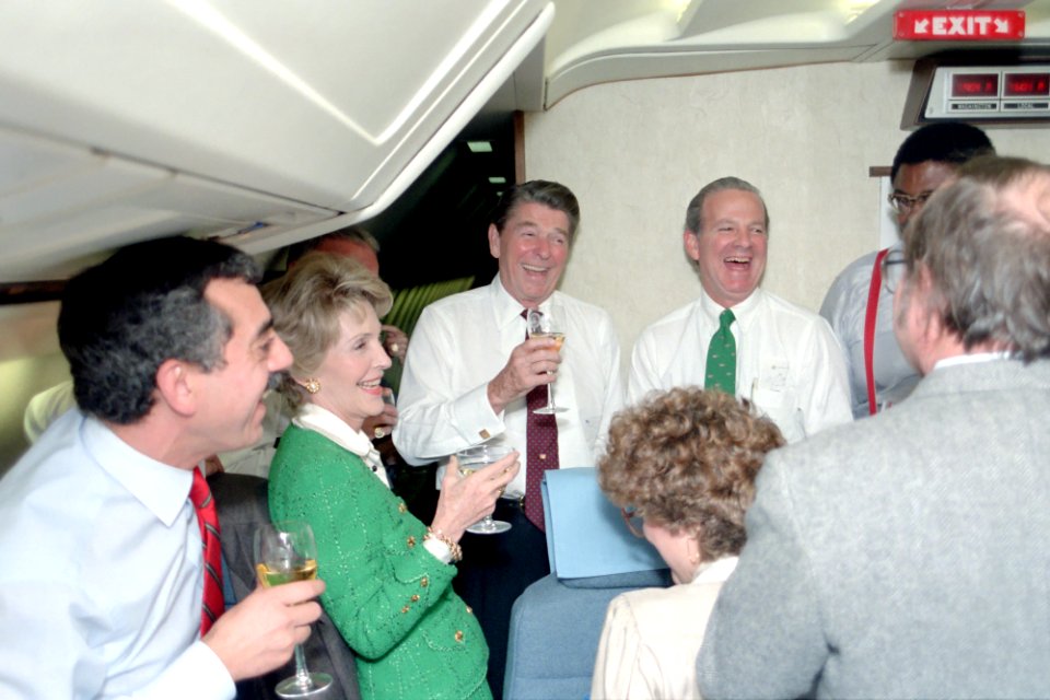 President Ronald Reagan, Nancy Reagan, James Baker, Ken Khachigian, Rosie Greer, and Lou Cannon celebrating the end of the 1984 presidential campaign
