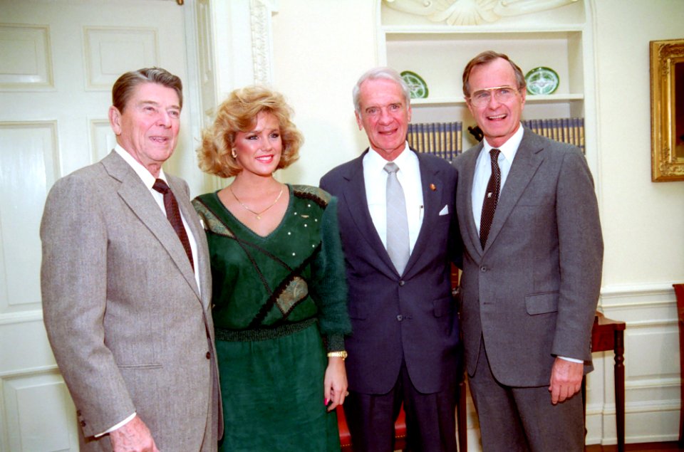 President Ronald Reagan with Susan Akin, Sonny Montgomery, and George H. W. Bush