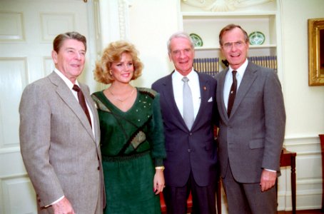 President Ronald Reagan with Susan Akin, Sonny Montgomery, and George H. W. Bush