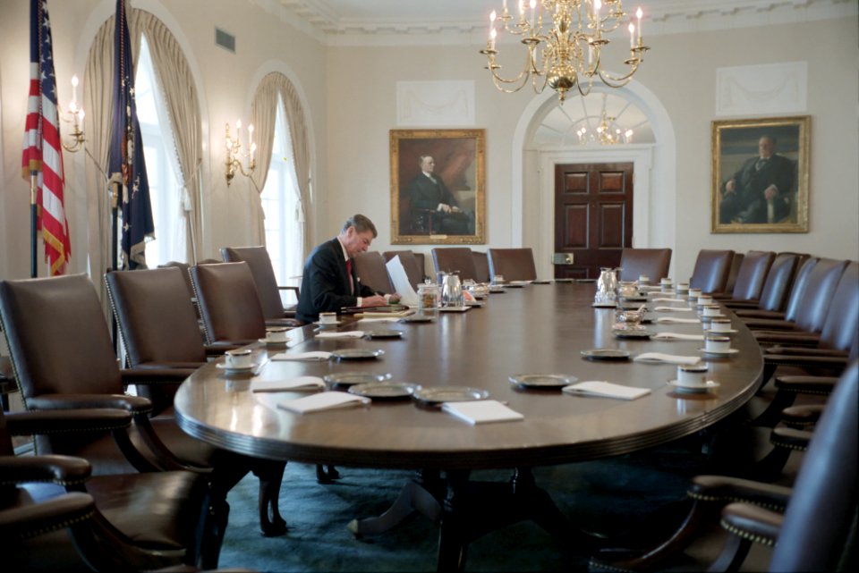 President Ronald Reagan working in the Cabinet Room