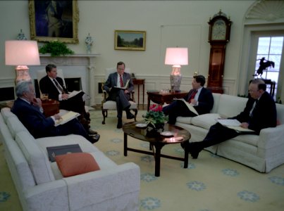 President Ronald Reagan during a briefing for Tower Commission photo