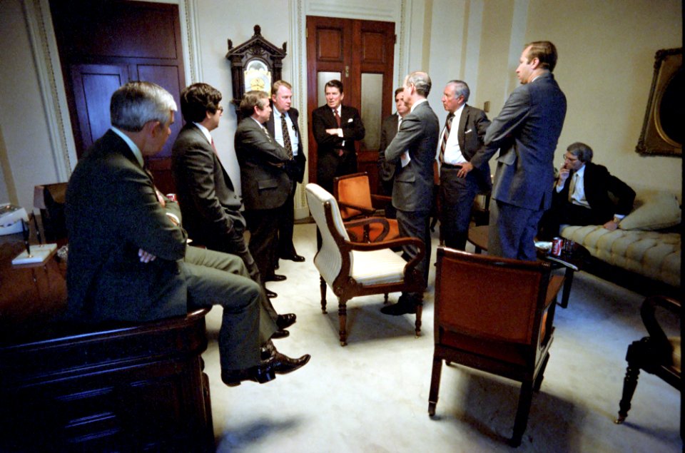 President Ronald Reagan during a meeting with bipartisan members of Congress to discuss budget compromise in the United States Capitol