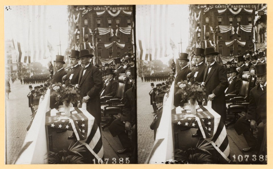 President Roosevelt with the Governor of Ohio and the Mayor of Canton reviewing parade on McKinley Memorial Day, Canton, Ohio LCCN2013649594