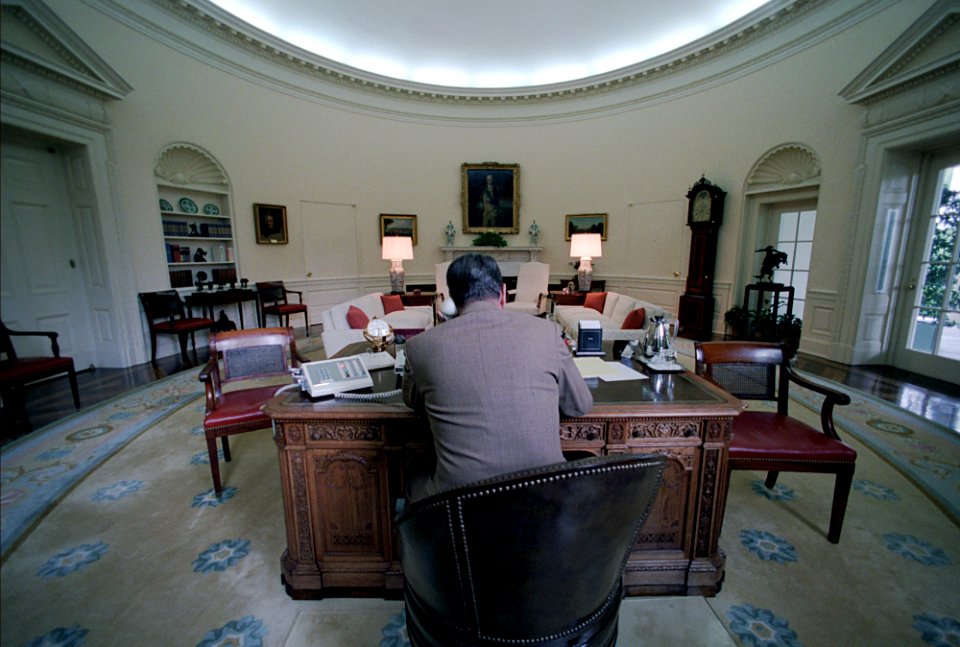 President Ronald Reagan during a telephone call to the 37th Annual National Convention of American Ex-Prisoners of War from the Oval Office