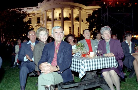 President Ronald Reagan, Nancy Reagan, Paul Laxalt, Bob Michel, Corrine Michel and Carol Laxalt Watch the Performance by Oak Ridge Boys during the Barbecue for Members of Congress on the South Lawn