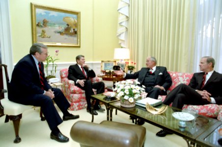President Ronald Reagan, Robert Michel, Howard Baker, and James Baker Meeting to Discuss Budget Negotiations in The East Sitting Hall