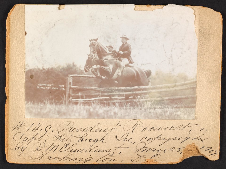 President Theodore Roosevelt and Capt. Fitzhugh, on horseback, jumping fence LCCN95512176