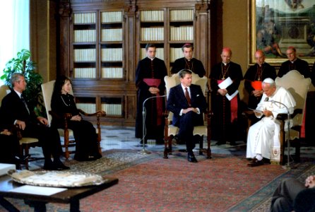 President Ronald Reagan and Nancy Reagan meet with Pope John Paul II at the Papal Library Vatican Pontifical Palace