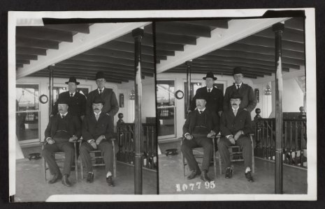 President Theodore Roosevelt posing with three other men, possibly on the deck of the steamer Mississippi LCCN2013651459