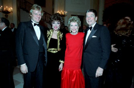 President Ronald Reagan and Nancy Reagan with Joan Collins and Peter Holm photo