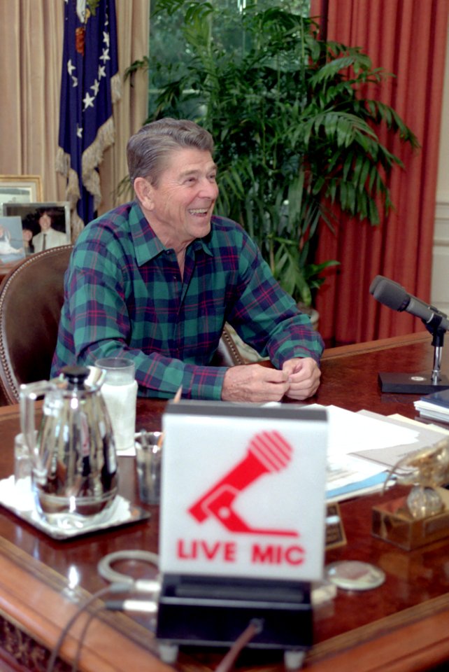 President Ronald Reagan making a radio address to the nation