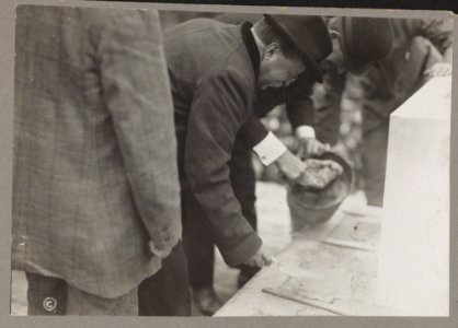 President Theodore Roosevelt applying mortar with a trowel LCCN2009633773