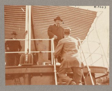 President Theodore Roosevelt greeting man aboard shipl LCCN2013649491