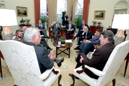 President Ronald Reagan meeting to discuss proposed Contra Aid Package