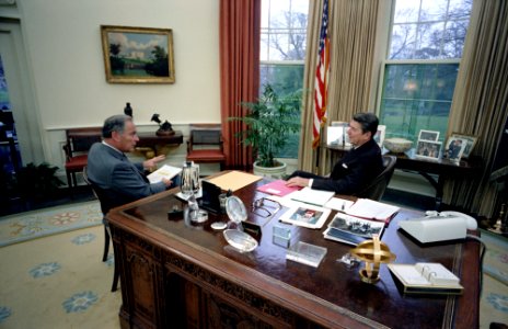 President Ronald Reagan meeting with Alexander Haig in the Oval Office photo