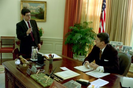 President Ronald Reagan meeting with Kenneth Duberstein in the Oval Office