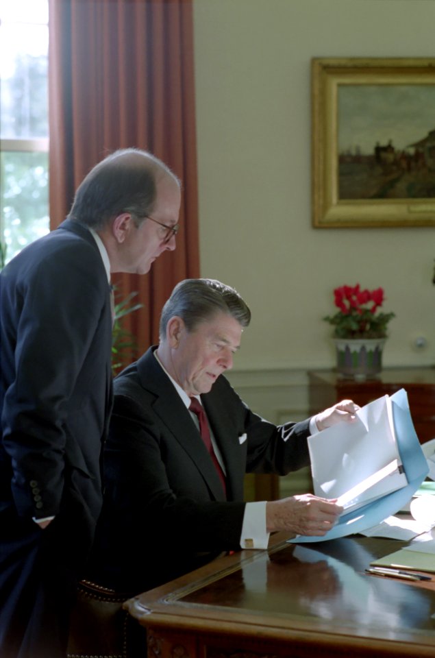 President Ronald Reagan Meeting with Michael Deaver in The Oval Office photo