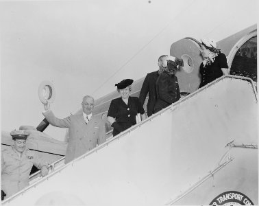 President Truman and his party board the presidential airplane to fly to Brazil. L to R, President Truman, Mrs. Bess... - NARA - 199689 photo