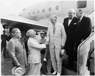 President Truman sees off Secretary of State George Marshall and two other delegates as they leave National Airport... - NARA - 199694 photo
