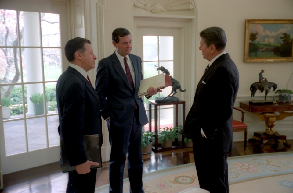 President Ronald Reagan meeting with William Clark and Caspar Weinberger