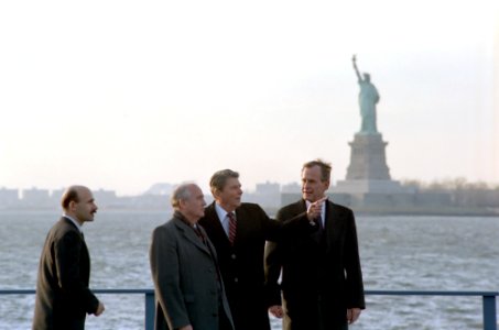 President Ronald Reagan and Vice-President George H. W. Bush meet with Soviet General Secretary Mikhail Gorbachev on Governor's Island New York photo