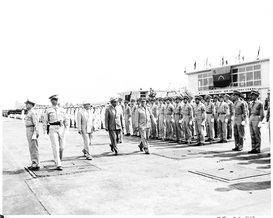 President Truman greets President Romulo Gallegos of Venezuela at the airport upon President Gallegos' arrival in the... - NARA - 199815