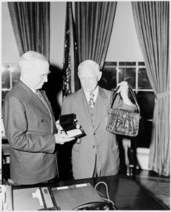 President Truman greets Prince Charles of Belgium at the door of the White House. Gen. Harry Vaughan stands in doorway. - NARA - 199758
