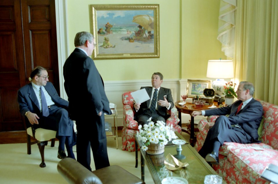 President Ronald Reagan at an economic meeting