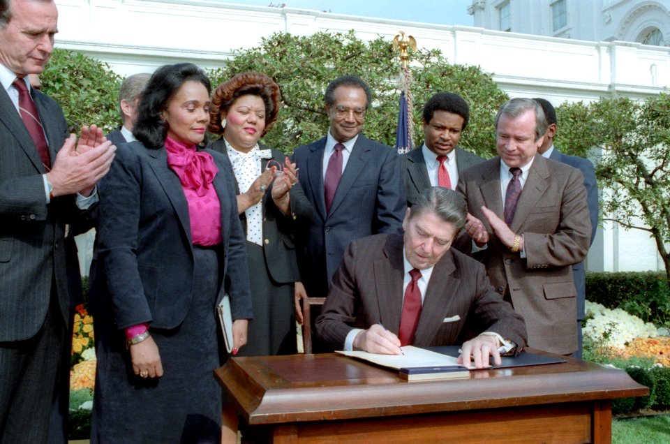 President Ronald Reagan at the Signing Ceremony for Martin Luther King Holiday Legislation