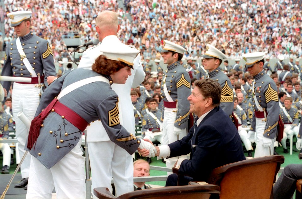 President Ronald Reagan shaking hands with cadets at the United States Military Academy commencement ceremony in West Point, New York