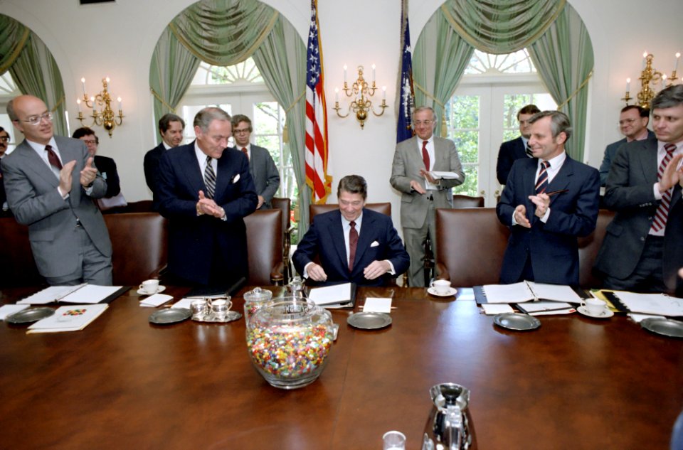 President Ronald Reagan attends his first cabinet meeting after assassination attempt
