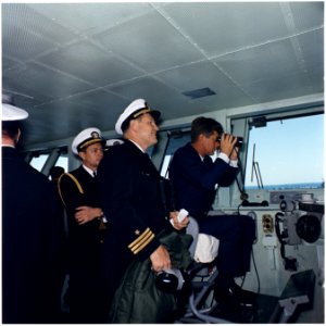 President views Atlantic Fleet Manuevers. Naval Aide Commander Tazewell Shepard, Commander Lang, President Kennedy.... - NARA - 194207