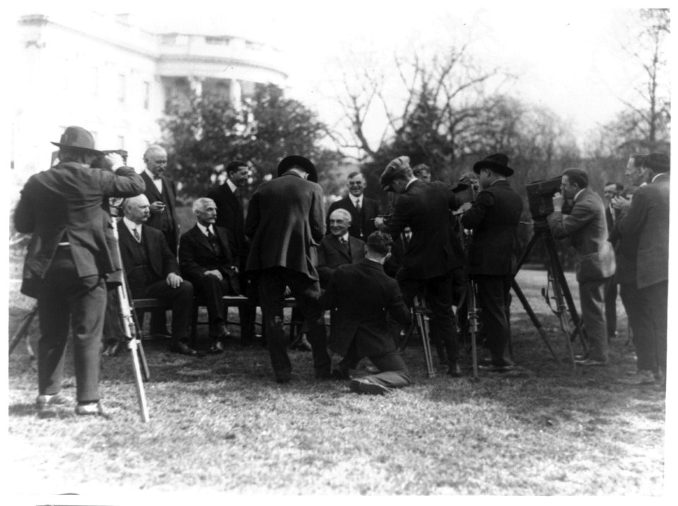 President Warren G. Harding and his cabinet posed on the White House Lawn, with photographers LCCN93513294