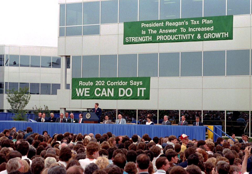 President Ronald Reagan speaking at a podium in Malvern, Pennsylvania