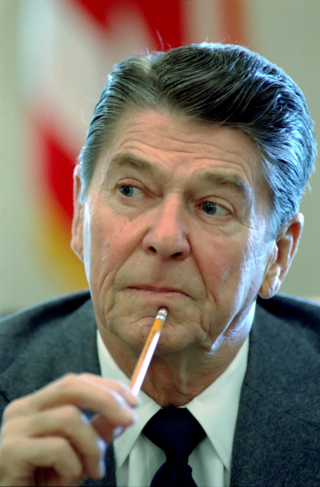President Ronald Reagan during a meeting with members of Congress in the Cabinet Room