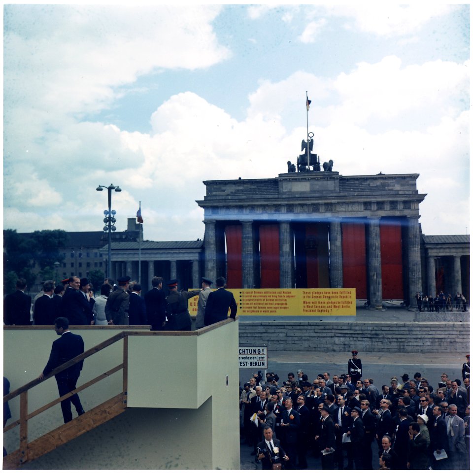 President's Trip to Europe- President on platform overlooking Brandenburg Gate. President Kennedy, others in party... - NARA - 194225
