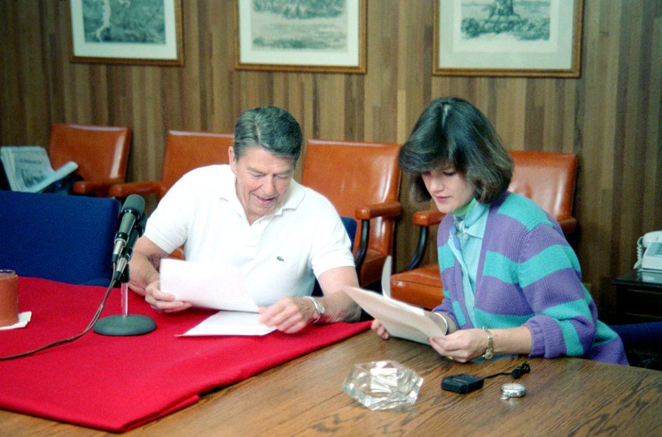 President Ronald Reagan during his Radio Address to the Nation with Elizabeth Board at Camp David