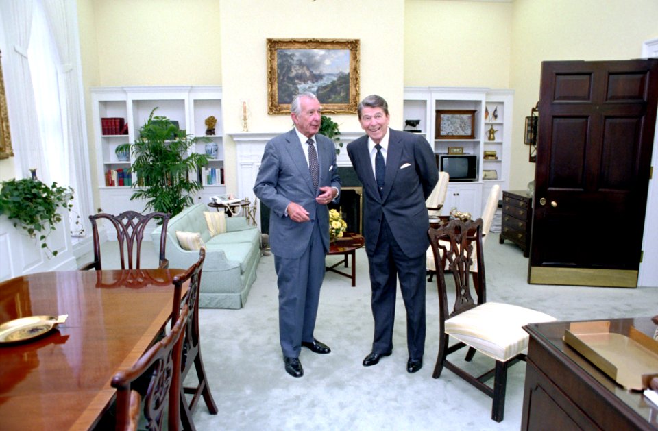 President Ronald Reagan talking with Donald Regan in his office